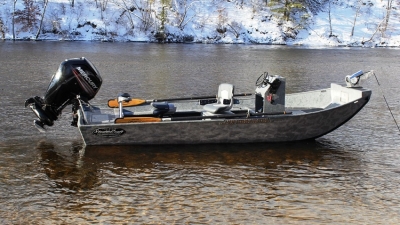 Boat on the Muskegon River outfitted with a jet motor that make river fishing easy. 